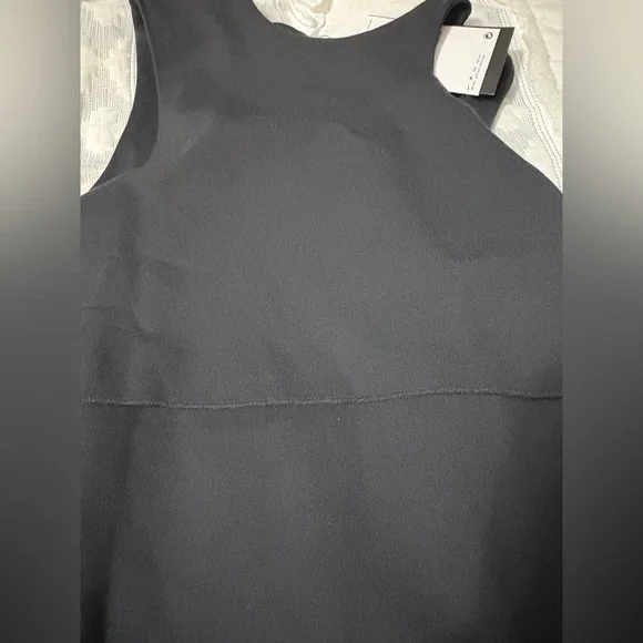 Nike Black Sleeveless Bodysuit NWT
Size M. Cute shoulder cutout detail. Stretchy - Picture 14 of 16